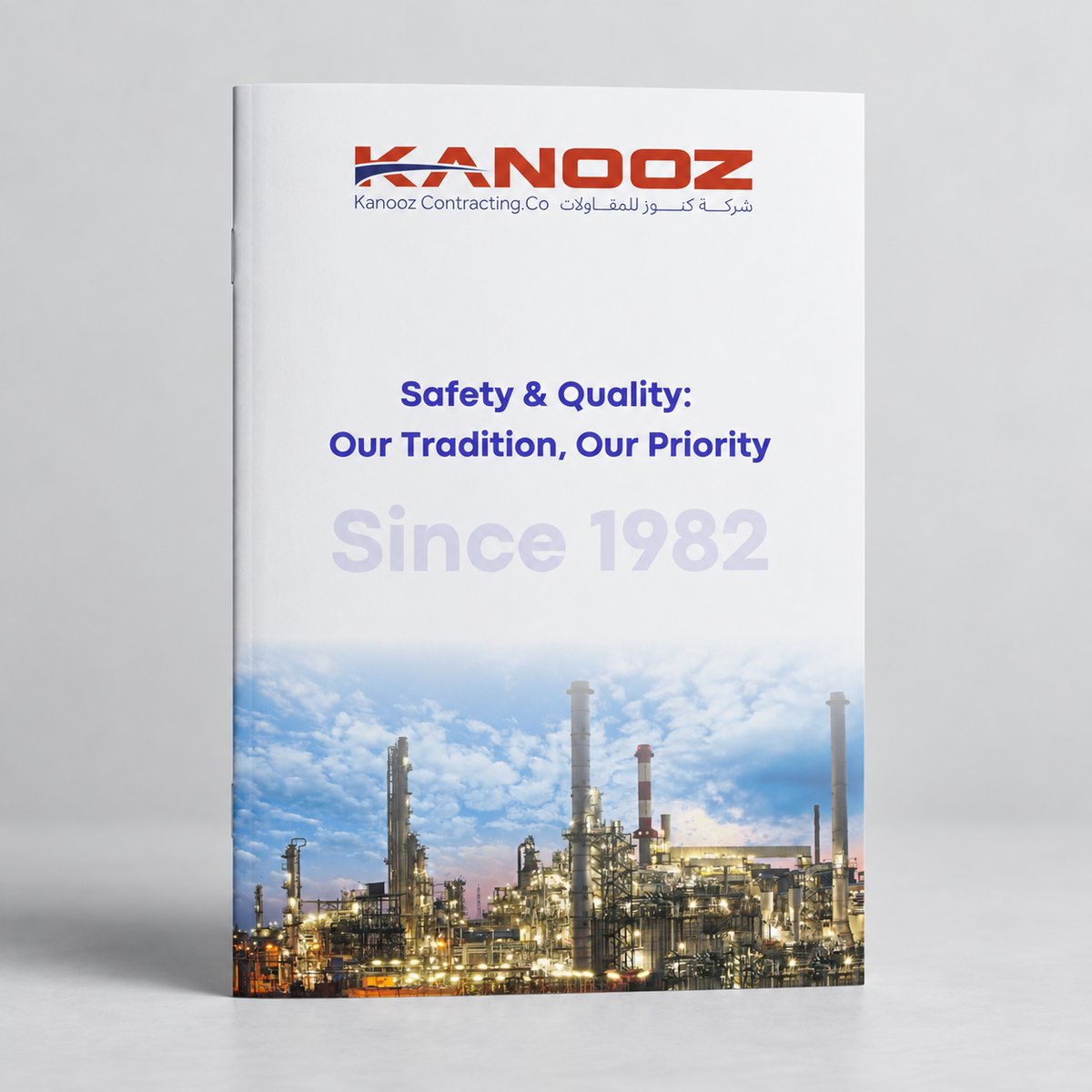 Company profile cover designed for a Jubail industrial contractor, shown as a printed brochure standing on a studio background
